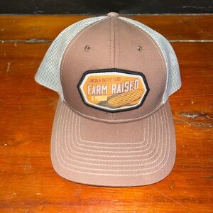 Brown and White Farm Raised Cap